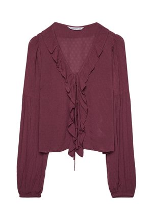 Blusa bordò con scollatura a V, dettagli in volant lungo il davanti e maniche a sbuffo lunghe. Realizzata in un tessuto strutturato con una vestibilità ampia.