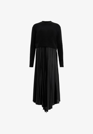 Schwarzes Kleid mit einem gestrickten, cropped Oberteil und einem plissierten Rock mit asymmetrischem Saum, gefertigt aus leichtem Stoff.