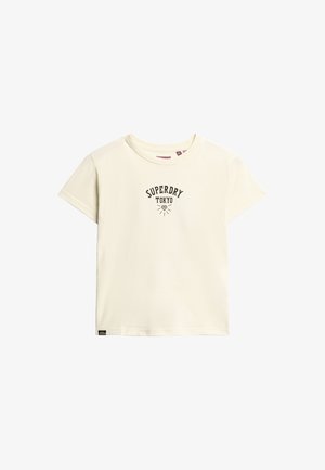 Camiseta corta de manga corta color crema, hecha de algodón, con un gráfico negro "SUPERDRY TOKYO" impreso en la parte delantera. Corte casual con escote redondo.