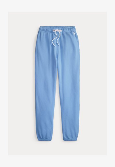 Ανοιχτό μπλε παντελόνι φόρμας με ελαστικά τελειώματα, λευκό κορδόνι στη μέση και μικρό λευκό λογότυπο στο δεξί ισχίο.