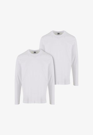 Due magliette bianche a maniche lunghe in cotone. Presentano un collo rotondo e polsini a coste. Design semplice, senza motivi o accenti.