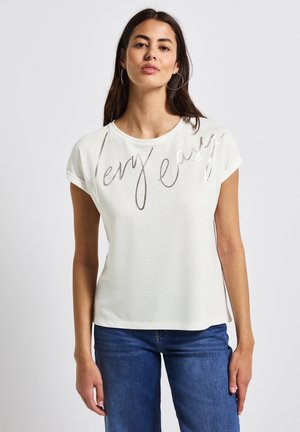 Lys beige kortærmet T-shirt med rund halsudskæring, prydet med metallic sølvfarvet skrift "very easy" tværs over fronten. Casual fit.