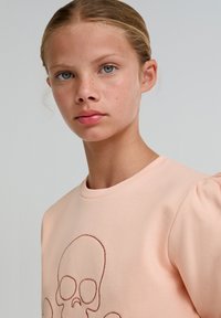 Scalpers RITA SKULL  - Bluză de molton - light coral