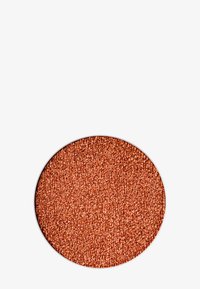 Metallic copper loose glitter in a circular container, featuring a fine texture and reflective shimmer, set against a white background.