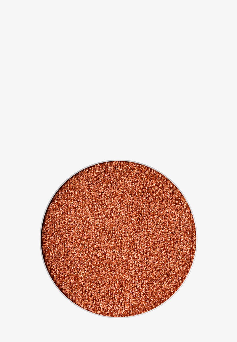 Metallic copper loose glitter in a circular container, featuring a fine texture and reflective shimmer, set against a white background.