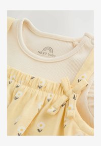 Atlasīts, yellow ditsy