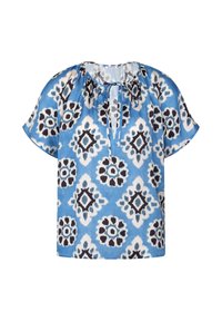 Blouse bleue à manches courtes avec motifs losanges et floraux blancs et noirs, encolure ronde avec une ouverture en trou de serrure à l'avant et fermeture par lien.