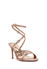 Sandal con tacco alto in oro rosa con più cinturini sottili, caratterizzata da decorazioni a effetto esplosione di stella e una finitura metallica liscia.