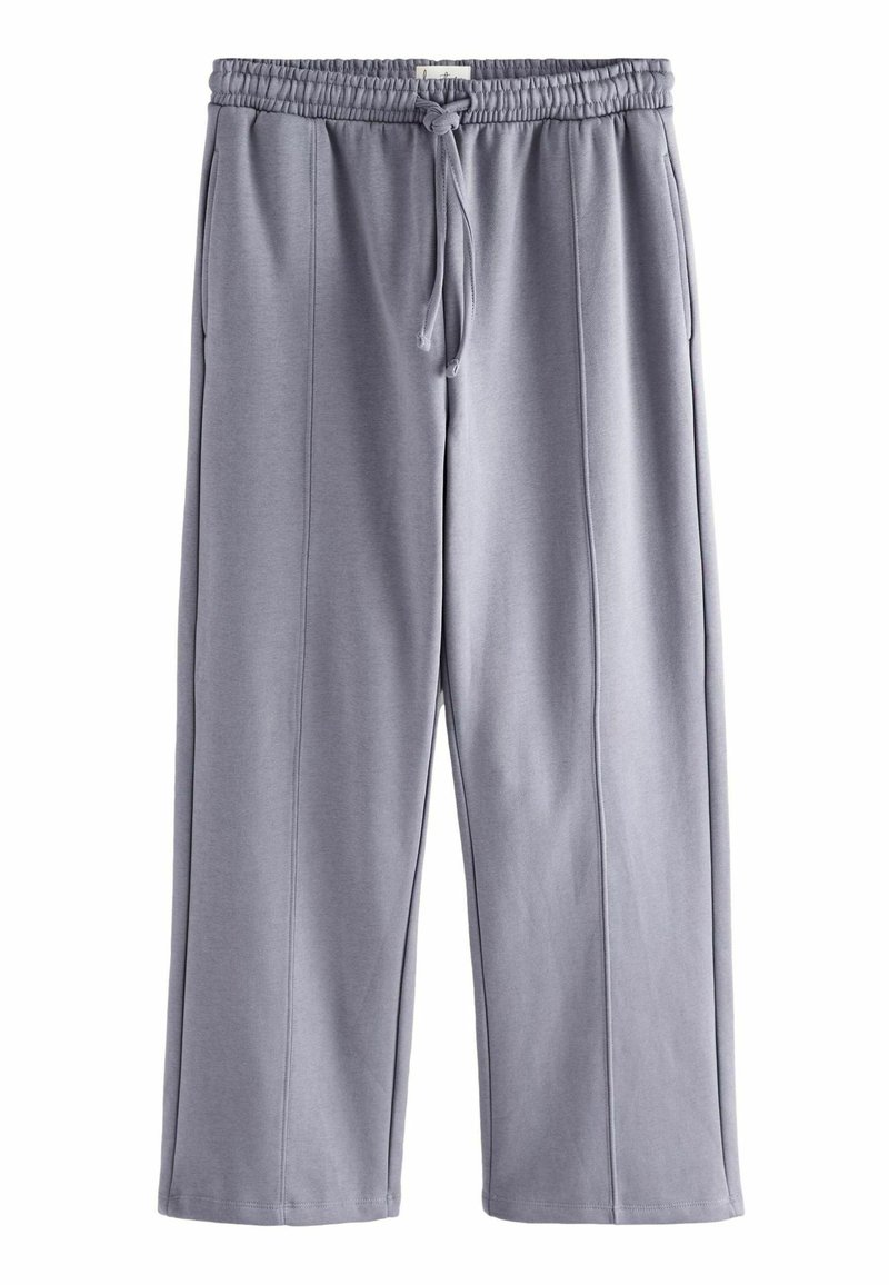 Grå sweatpants lavet af blødt stof, med elastisk talje og justerbar snøre, sidelommer og lige ben.