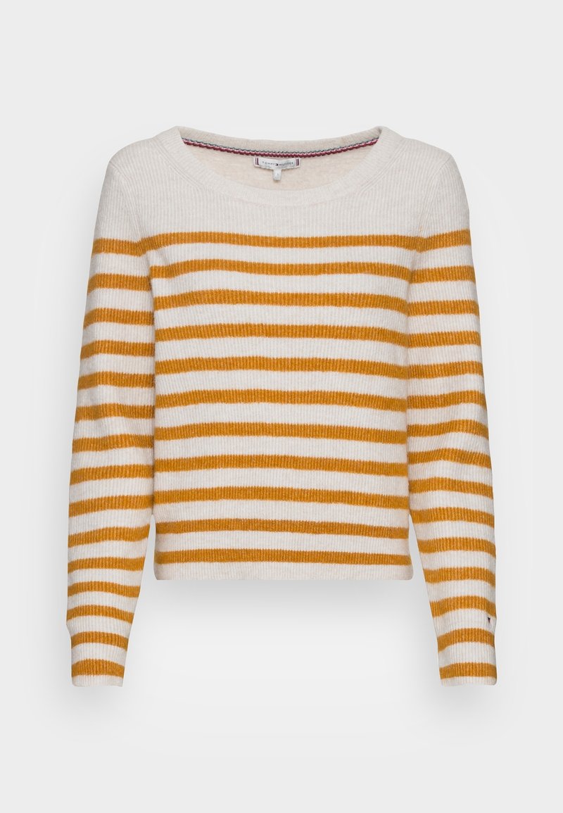 Pull-over rayé en crème et jaune moutarde. Texture côtelée, encolure large et manches longues avec une coupe carrée.