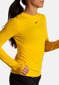 Brooks HIGH POINT - Pikkade varrukatega topp - lemon chrome