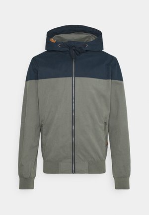 Hooded jacket featuring a two-tone design with dark blue and olive green sections, a front zipper, and elastic cuffs and hem.