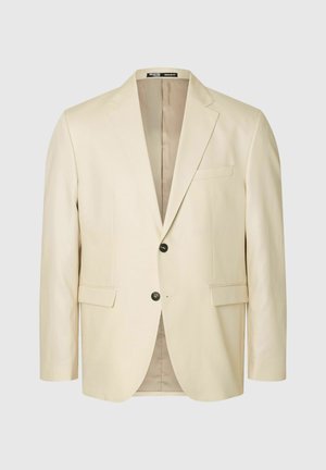 Beige, szabott blézer, két elülső zsebbel, egy gombos záródással és kis csúcsú hajtókákkal. Simább szövet, letisztult, modern dizájnnal.