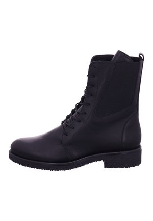 Black leather ankle boot with lace-up front, textured rubber sole, elastic side panels, and a slightly raised heel. Classic design.