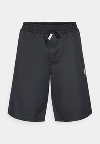 Bañador negro con cintura elástica y cordón. Confeccionado en material ligero con una textura suave y un pequeño detalle de logo en el lado.