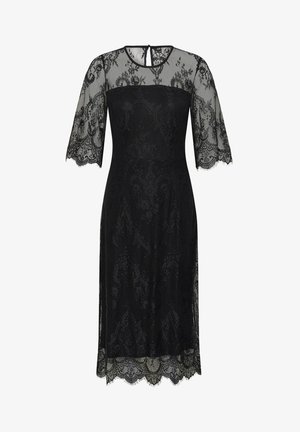 Must mustrõng mustriilledega must kleit, millel on lilleline pitskate, läbipaistvad pitsist küünarvarre-sleeve'd, ümmargune kaelus ja laineline äär.