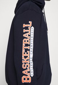 Mennace Jersey con capucha - blue