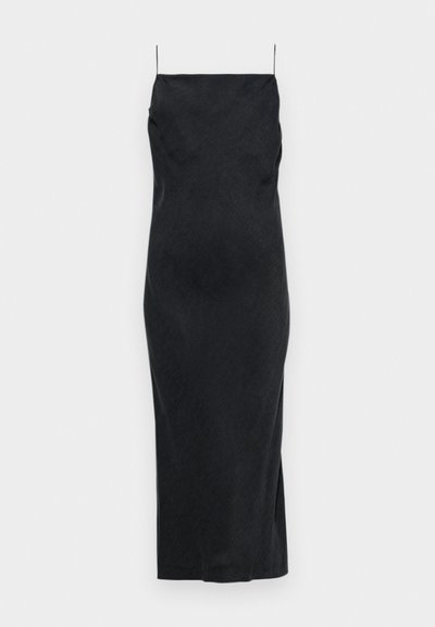 Black slip dress with thin spaghetti straps, fitted silhouette, mid-length, side slit, and textured fabric with a subtle pattern.