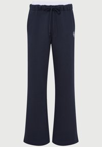 Pantaloni felpa a gamba larga blu navy con elastico bianco in vita, tasche frontali, chiusura con coulisse e piccolo logo bianco sulla coscia destra.