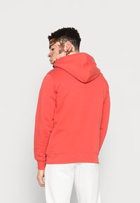 Calvin Klein Jeans SEASONAL MONOLOGO REGULAR HOODIE - Camisola - rhubarb red