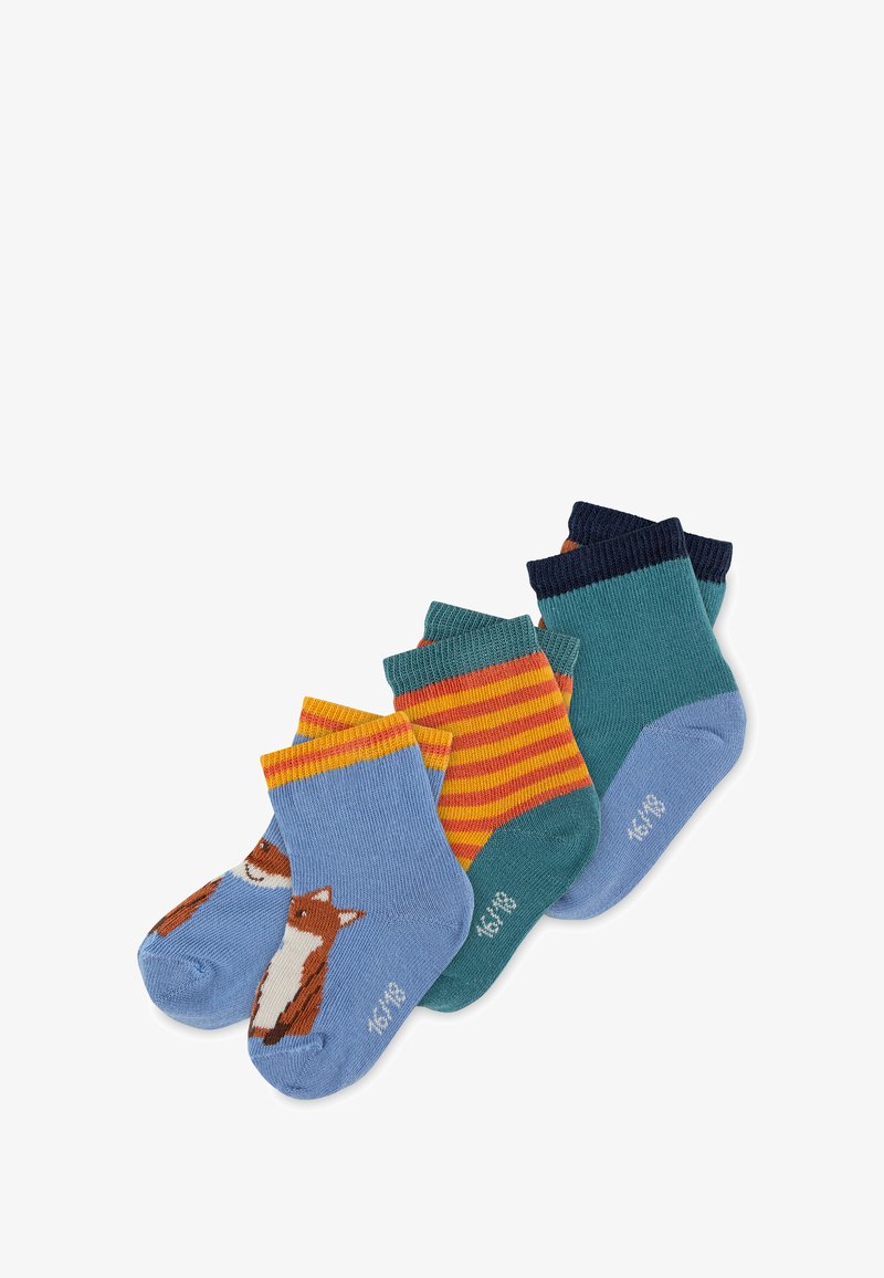 Set von vier Paar Kindersocken. Merkmale sind ein blauer Socken mit einem Fuchsdesign, gestreifte Muster, einfarbige Farben und gerippte Bündchen.