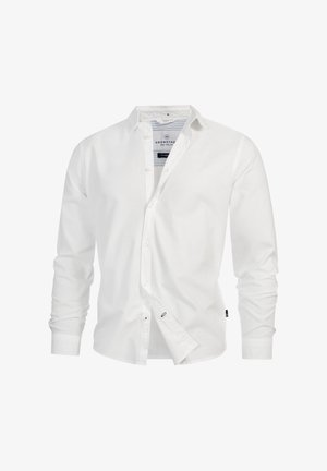 Hvid, langærmet skjorte med knapper og krave, let åbnede knapper samt synligt stribet inderlabel med mærket Kronstadt.