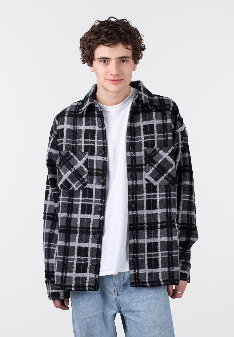 Pegador Lichte jas zwart