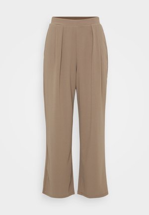 Brown, wide-leg trousers made of soft fabric featuring front pleats and an elastic waistband for comfort. Clean, minimalist design.