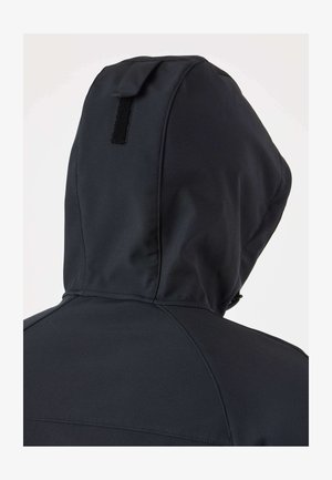 Veste noire à capuche vue de dos avec un design de couture visible et un petit patch rectangulaire en Velcro sur la capuche.