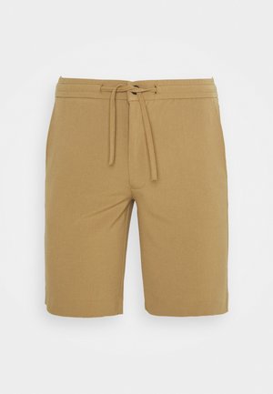 Pantaloncini color khaki realizzati in tessuto morbido, con una cintura elastica con coulisse e un taglio dritto, senza motivi o dettagli visibili.