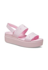 Pink platform sandals made of soft, textured rubber with two wide straps and an adjustable back strap; features ventilation holes.