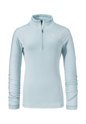 Helles blaues, langärmeliges Oberteil aus strukturiertem Stoff mit einem Viertel-Reißverschluss am Hals, das eine figurbetonte Passform und ein dezent auf der Brust angebrachtes Logo aufweist.