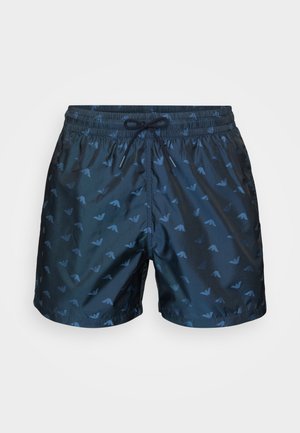 Costumini da bagno di colore blu scuro, realizzati in materiale liscio, con un motivo sottile di motivi blu chiaro, cintura elasticizzata con cordino.
