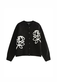 Cardigan noir boutonné avec motifs abstraits de roses blanches à l'avant, poignets et ourlet côtelés, col rond.