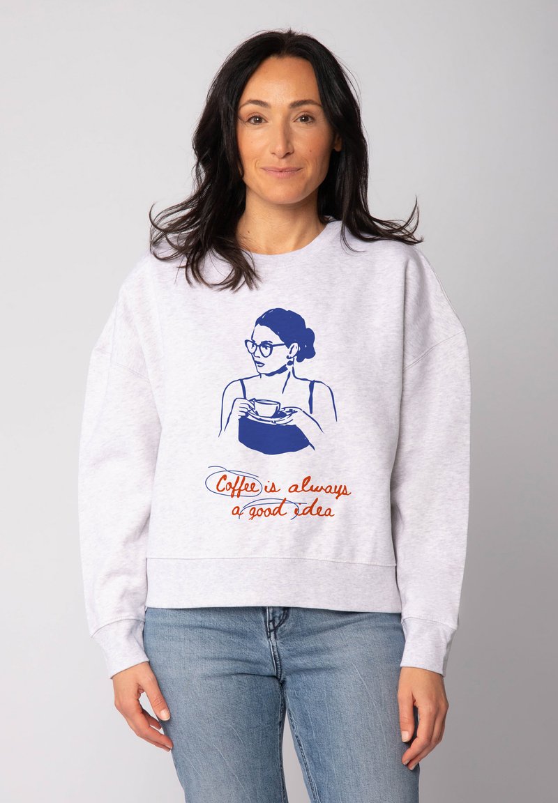 Grey sweatshirt featuring a blue graphic of a woman with glasses holding a cup and text, "Coffee is always a good idea," in red.