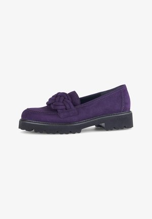 Purple suede loafers with a knotted accent on the front, featuring a thick black rubber sole and a rounded toe design.