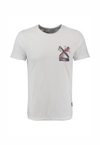 Camiseta blanca de manga corta con un diseño floral y trazos oscuros en la parte superior izquierda del pecho.
