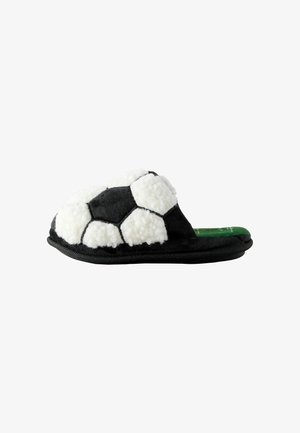 Chausson doux noir et blanc en forme de ballon de football avec une semelle intérieure verte et une semelle rembourrée pour une utilisation en intérieur.