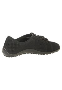 Black mesh athletic shoes with rounded toe, lace-up design, textured fabric, and rubber sole featuring small traction dots.