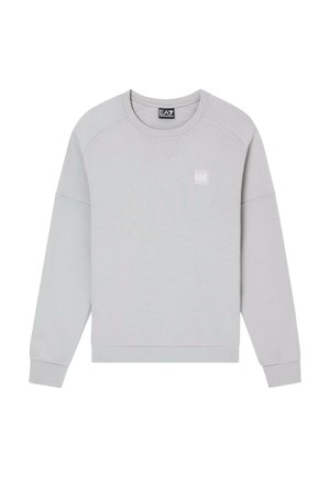 Felpa grigia con maniche lunghe, scollo rotondo e orlo a costine. Presenta una targhetta con logo bianco sul lato sinistro del petto, realizzata in morbido tessuto di cotone.