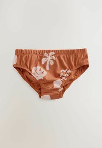 Rustfarvede badetights med hvide palmetræer og bølgemønstre; lavet af blød, strækbar stof; elastisk talje for komfort.