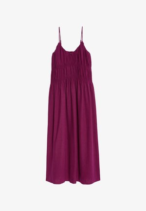 Purple sleeveless dress with a smocked bodice, flared skirt, and adjustable straps, made from lightweight fabric. No visible patterns or hardware.