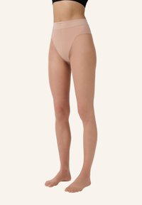 Beige hochgeschnittene Slips aus transparentem Material, mit einem glatten Bund und nahtlosem Design, die den Komfort und die Passform verbessern.
