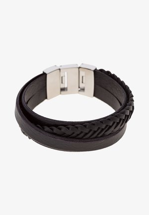 Bracelet en cuir noir avec des lanières tressées et lisses et une fermeture à clip en métal argenté.