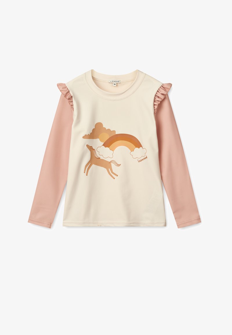 Long-sleeve top with cream body, blush pink sleeves, ruffled accents, and a graphic of a horse, rainbow, and clouds in warm tones.