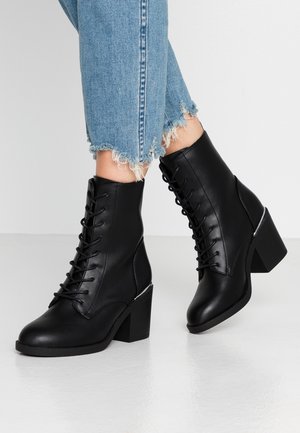 Bottines à lacets - black