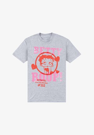 Camiseta de algodón gris con una ilustración estilo cómic de una chica con ojos grandes, rodeada de corazones y texto en negrita en rosa y naranja.
