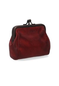 Rotes Leder-Münzmäppchen mit einem metallenen Druckverschluss, das eine abgerundete Form und eine glatte Textur aufweist. Markenname in die Oberfläche geprägt.