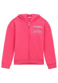 Sudadera rosa con cremallera y capucha, que presenta un gráfico frontal que dice "HAPPY GUESS". Está hecha de una tela suave con puños y dobladillo acanalados.