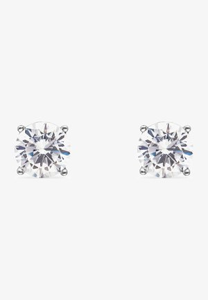 Boucles d'oreilles en zirconium cubique transparent et rond, serties en argent. Le réglage à quatre griffes met en valeur l'éclat et la clarté brillants. Design simple et élégant.